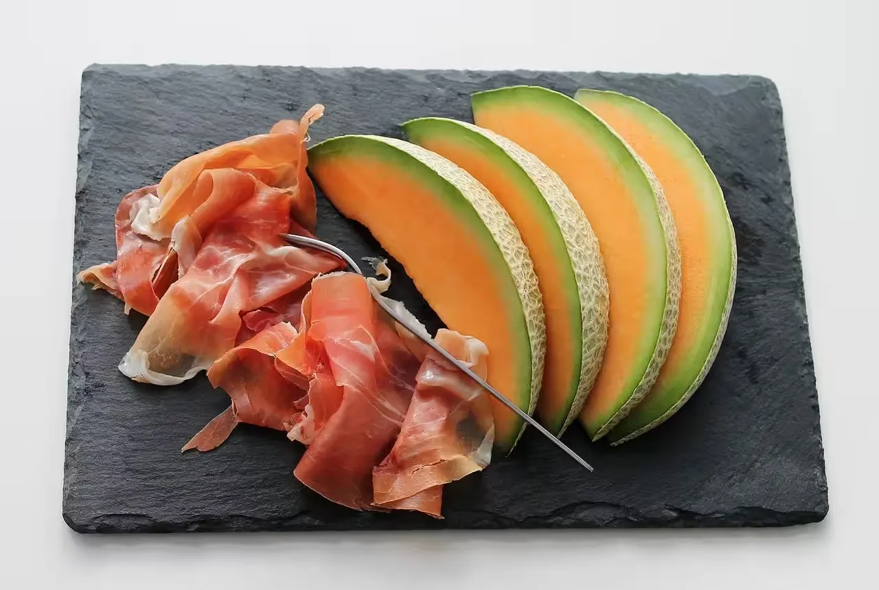 melon on black tray 39350