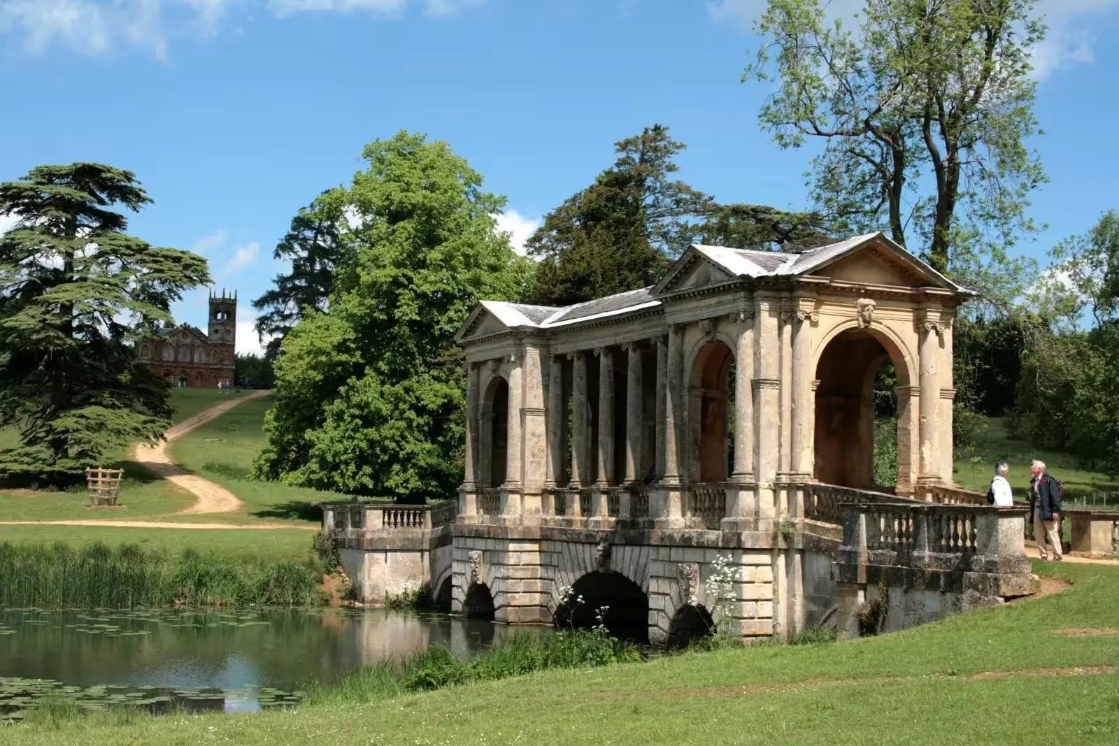 The Palladian Bridge at Stowe Landscape Gardens, with the Gothic Temple on the hill behind